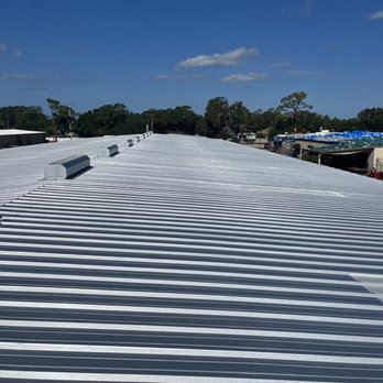Compass Roofing Services - New Metal Warehouse Roof - Roofing Near Me Compass Roofing Services - New Metal Warehouse Roof - Roofing Near Me