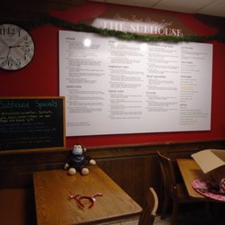 The Subhouse - Menu board and a small seating area, on the right when you walk in.
