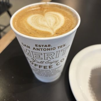 Merit Coffee - Honey  Cinnamon Oat milk Latte  I'm a sucker for the cute little designs - Coffee & Tea Near Me - Shavano Park, Texas