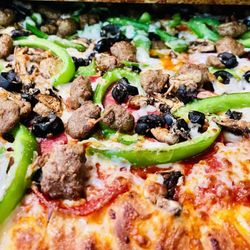 Tahoe’s Pizza  - Combination beef sausage, pepperoni, bell peppers,
mushroom, and olives