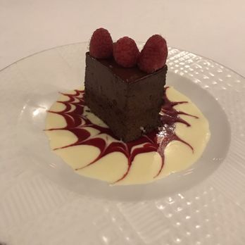 Lynn's Bistro - Moose chocolate cake... it's good but I'd try something else (very dense was expecting a sponge somewhere) - French Near Me - Kirkland, Washington