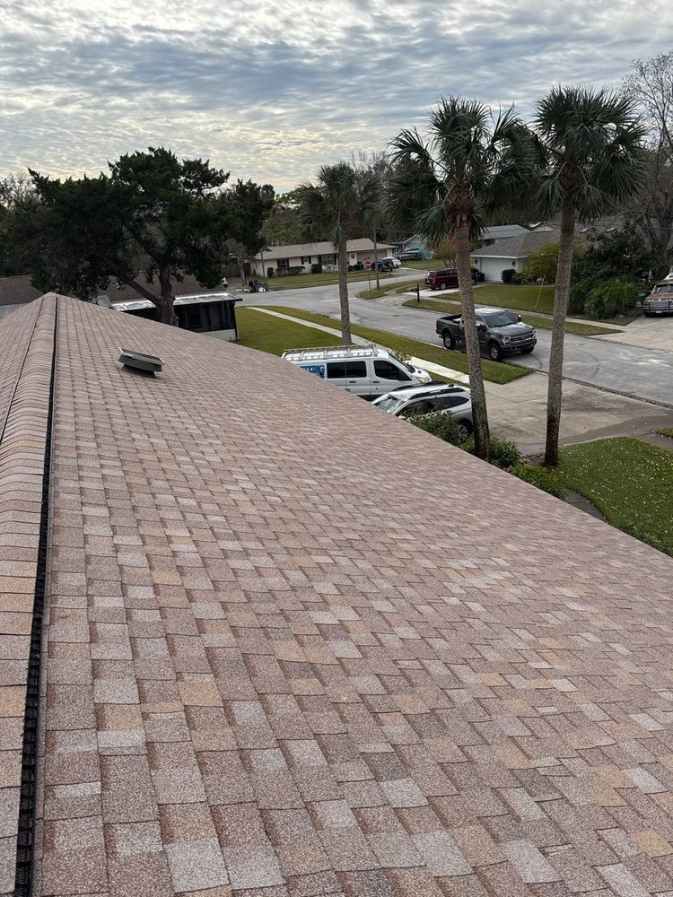 Slide of Whiting Roofing