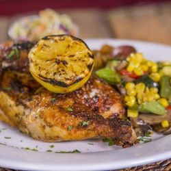 Cluckers Catering - Brick Chicken with fresh veggies sauted in olive oil