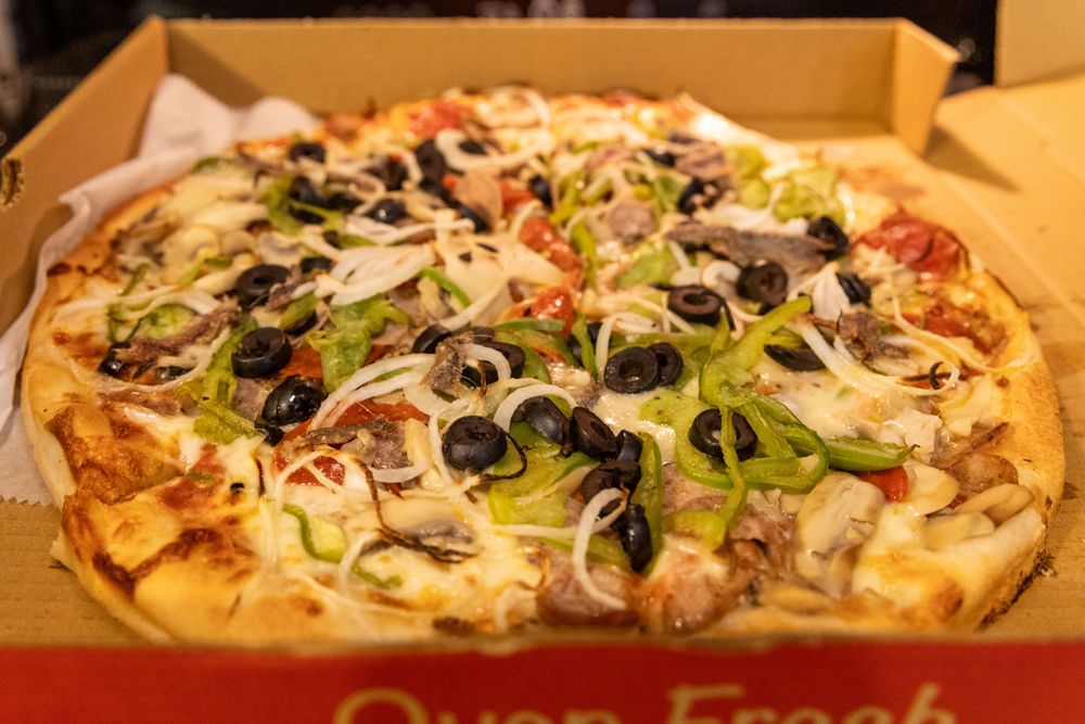 Charlestown Famous Pizza Logo