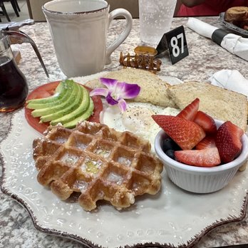 Harvest Kitchen & Bakery - Waffle, eggs, avocado & tomato slices with toast & a fruit cup. - Breakfast & Brunch Near Me - Katy, Texas Harvest Kitchen & Bakery - Waffle, eggs, avocado & tomato slices with toast & a fruit cup. - Breakfast & Brunch Near Me - Katy, Texas