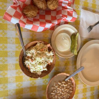 Uncle Bud's - Fixin's:  hush puppies, pickles and slice of onion, creamy slaw and white beans. - Seafood Near Me - Nashville, Tennessee