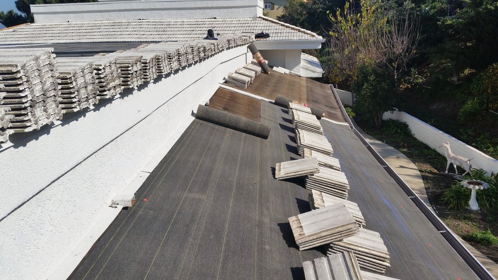 Slide of Hi Tech Roofing Contractor SVC