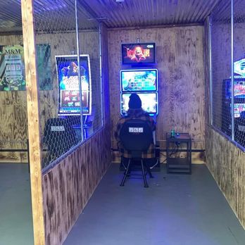 M&M Gaming - two people playing video games - Beer Bar Near Me - Royalton, Illinois M&M Gaming - two people playing video games - Beer Bar Near Me - Royalton, Illinois