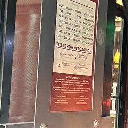 Hours of operation posted in the drive thru Hours of operation posted in the drive thru