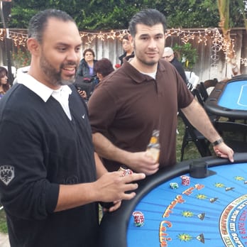 Full House Casino Events - The guys risking it up at the blackjack table. ..hit me! - Party Equipment Rentals Near Me