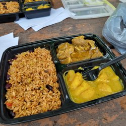 Amira's Hot Roti and Doubles - Curry goat lunch special
