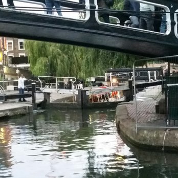 Canal and River Cruises - A lock at Camden Market. There was another boat in front of us, but the captain knew Mike and moved out of the way so we could get closer! - Boat Tours Near Me - London, XGL