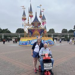 Select Mobility Scooter Rental - Scooter out front of Disney's 70th Celebration Decor