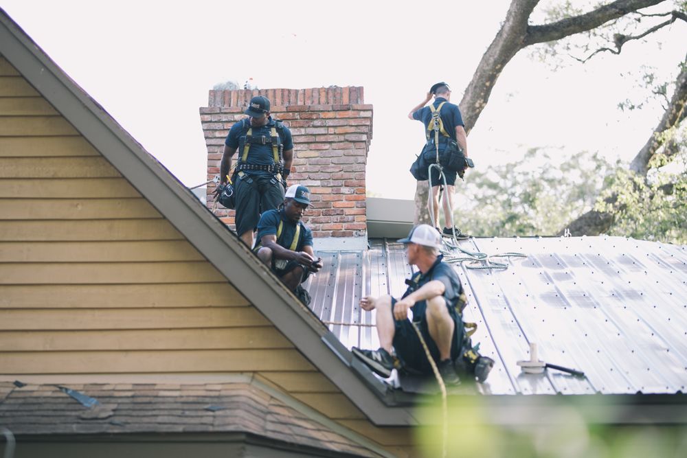 Slide of Tadlock Roofing