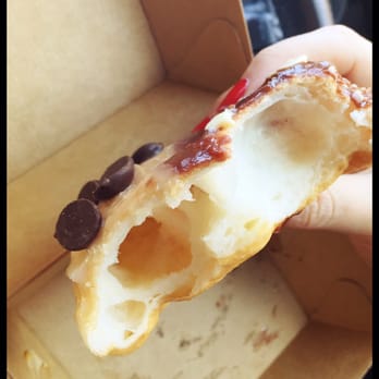 Doughnut Time - My disappointing gf doughnut. Complete with monstrous holes. - Bakeries Near Me - Clayfield, QLD