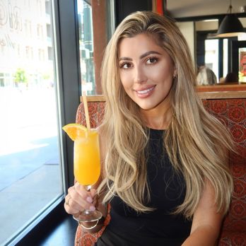 Rio on Wazee - The Mimosarita was made with Rio's own Classic Marg, fresh-squeezed OJ, and champagne. - Mexican Near Me - Denver, Colorado Rio on Wazee - The Mimosarita was made with Rio's own Classic Marg, fresh-squeezed OJ, and champagne. - Mexican Near Me - Denver, Colorado