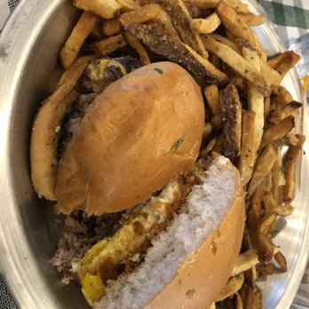 Rodeo Goat - Cheddar cheese, cheddar crisps, and a fried egg with a mound of fries - Burgers Near Me - Houston, Texas