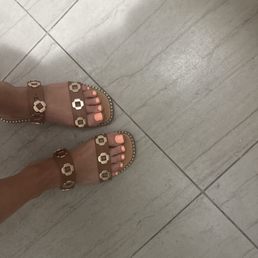 Fresh gel pedi with an acrylic touch on one of my toes that was chipped from stubbing my toe they're soo perfect!!