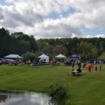 Collegeville Orchards - a group of people walking around a pond - Fruits & Veggies Near Me - Saint Joseph, Minnesota Collegeville Orchards - a group of people walking around a pond - Fruits & Veggies Near Me - Saint Joseph, Minnesota