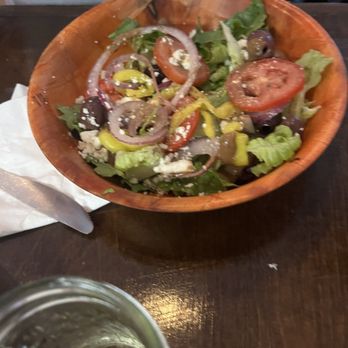 Woody's Pizza - Split a greek. They brought 2 bowls. Unnecessary. - Pizza Near Me - Folly Beach, South Carolina Woody's Pizza - Split a greek. They brought 2 bowls. Unnecessary. - Pizza Near Me - Folly Beach, South Carolina