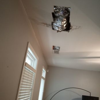 New Vision Contractor - a damaged ceiling in a home - General Contractors Near Me