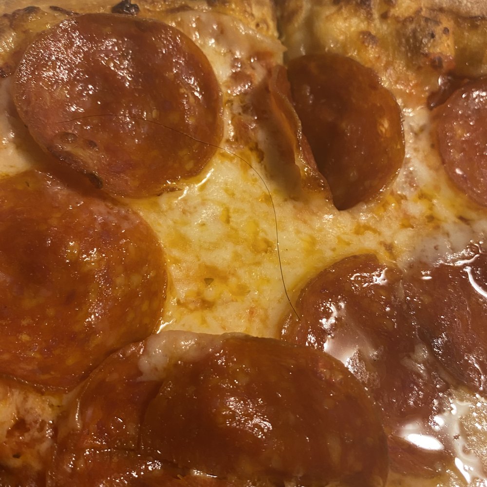 Found hair on a slice of pizza. Called store to notify and they didnt offer a refund or new pizza. Disgusting and unacceptable. Found hair on a slice of pizza. Called store to notify and they didnt offer a refund or new pizza. Disgusting and unacceptable.
