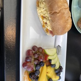 Breakfast bun with side fruit Breakfast bun with side fruit
