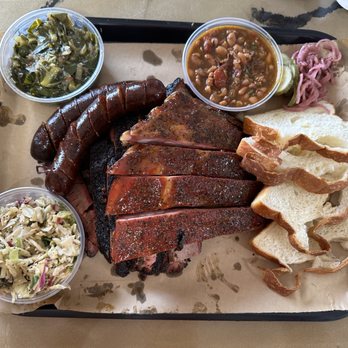 Smokemade Meats + Eats - Brisket, Ribs and Sausage with greens, beans and cole slaw. Very good homemade bread. - Barbeque Near Me - Orlando, Florida Smokemade Meats + Eats - Brisket, Ribs and Sausage with greens, beans and cole slaw. Very good homemade bread. - Barbeque Near Me - Orlando, Florida