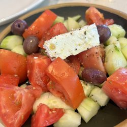 Santorini by Georgios - This was the happy hour Greek salad minus the onions it's amazing