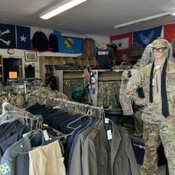 Carl's Military Surplus - Left side of the store. Boots, uniforms (flight crew, ACUs, dress, PTs, etc.).
