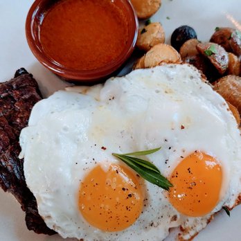 Josephine House - Steak and Eggs with potatoes and chimichuri sauce - American Near Me - Austin, Texas Josephine House - Steak and Eggs with potatoes and chimichuri sauce - American Near Me - Austin, Texas