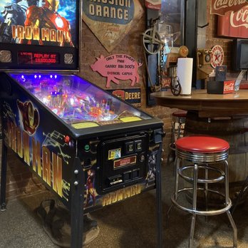 Big Dog's Smokehouse BBQ - a pinball machine and stool - Barbeque Near Me - Cicero, Indiana Big Dog's Smokehouse BBQ - a pinball machine and stool - Barbeque Near Me - Cicero, Indiana