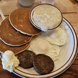 Log Cabin Pancake House of Gatlinburg - Pancakes, eggs over easy, sausage & grits