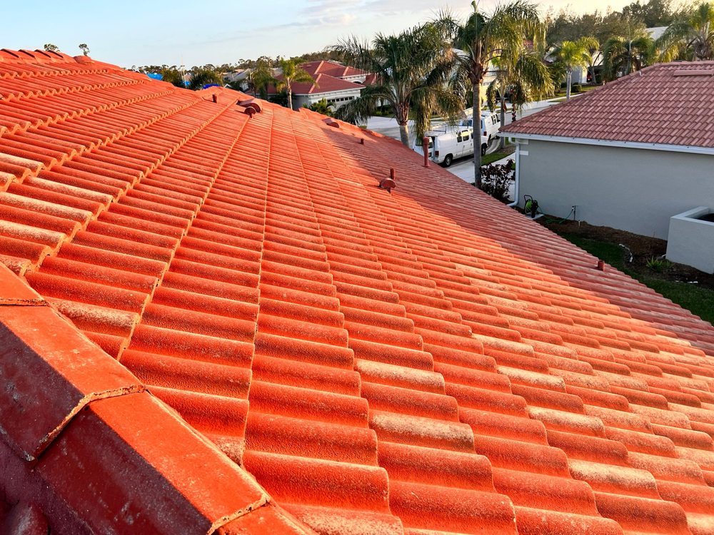Slide of CM Roofing Pros