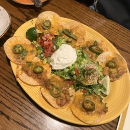 The nachos on the appetizer menu The nachos on the appetizer menu