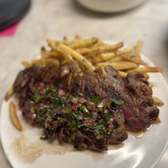 Copper & Sage - NY STEAK & FRITES,10 oz ny strip with chimichurri and rosemary-parmesan Frites - Cocktail Bars Near Me - Goodyear, Arizona
