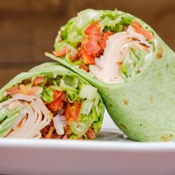 Smoked Turkey Club Wrap on a Spinach Sheet