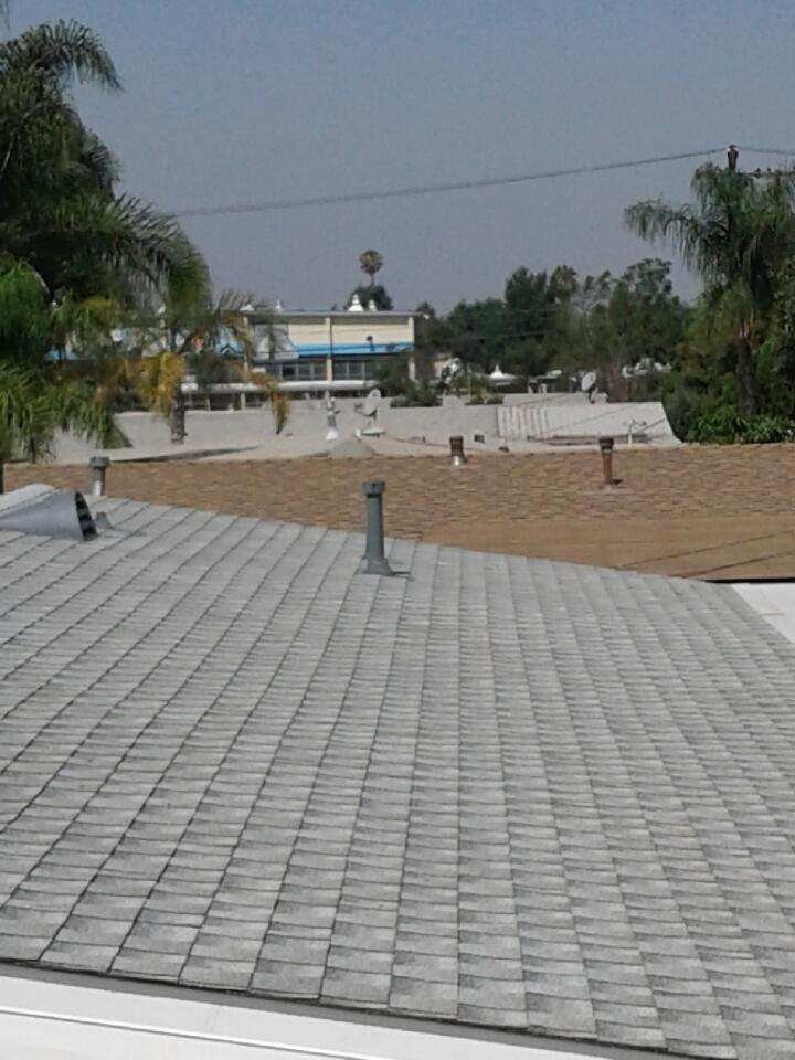 Slide of Rain Dance Roofing