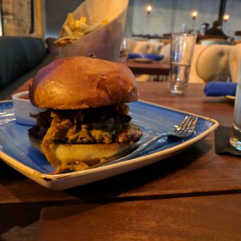 STIRR - Pig and cow burger. Ordered medium rare. Arrived medium well, much to my dismay and +1's delight. - Cocktail Bars Near Me - Dallas, Texas STIRR - Pig and cow burger. Ordered medium rare. Arrived medium well, much to my dismay and +1's delight. - Cocktail Bars Near Me - Dallas, Texas