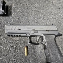 Range USA Clinton Township - Just one of the awesome rentals. The Sig X-Ten. Loved it so much I had to go get me a 10mm. :)