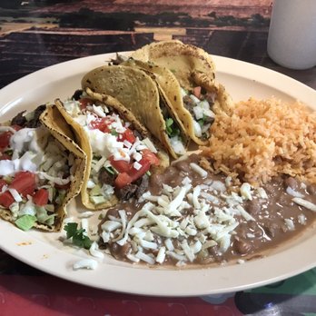 Chilango Express - 2 lengua tacos and 2 steak tacos. - Mexican Near Me - West Allis, Wisconsin
