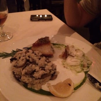 Zio Toto - Chilean Sea Bas pan fried with mushroom risotto. - Italian Near Me - Staten Island, New York Zio Toto - Chilean Sea Bas pan fried with mushroom risotto. - Italian Near Me - Staten Island, New York