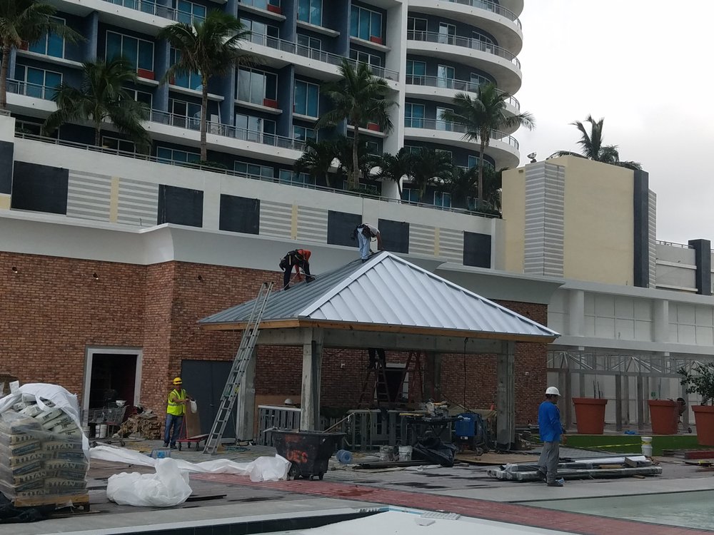 Slide of Caye Works Roofing