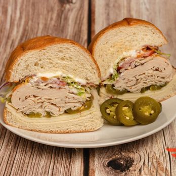 AZ Sandwich Co & Catering - #25 Spicy Chicken Club shorty sub cut in half - Sandwiches Near Me - Tempe, Arizona AZ Sandwich Co & Catering - #25 Spicy Chicken Club shorty sub cut in half - Sandwiches Near Me - Tempe, Arizona