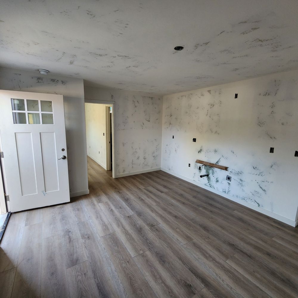 unfinished living room with wood floors unfinished living room with wood floors