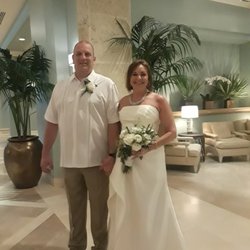 Awe Flowers & Potted Plant Shop - Happy bride showing her bouquet