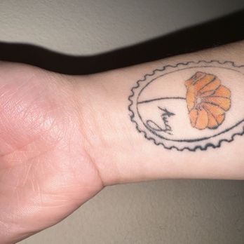 Doll House Tattoo - Healed, with stray line - Tattoo Near Me
