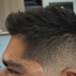 Bell & Anchor Barbershop - Zero fade. Choppy textured top.  Haircut by Alex.  Book online: bellandanchor.reserva.com