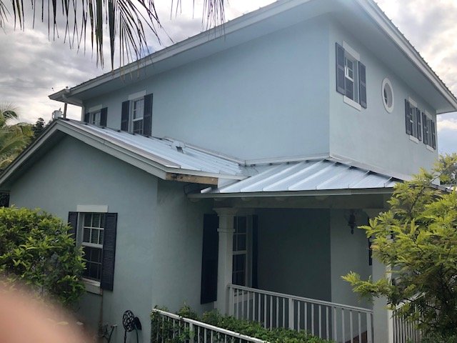 Slide of South Miami Roofing