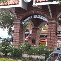 The entrance to the town. Surrounded by white roses.